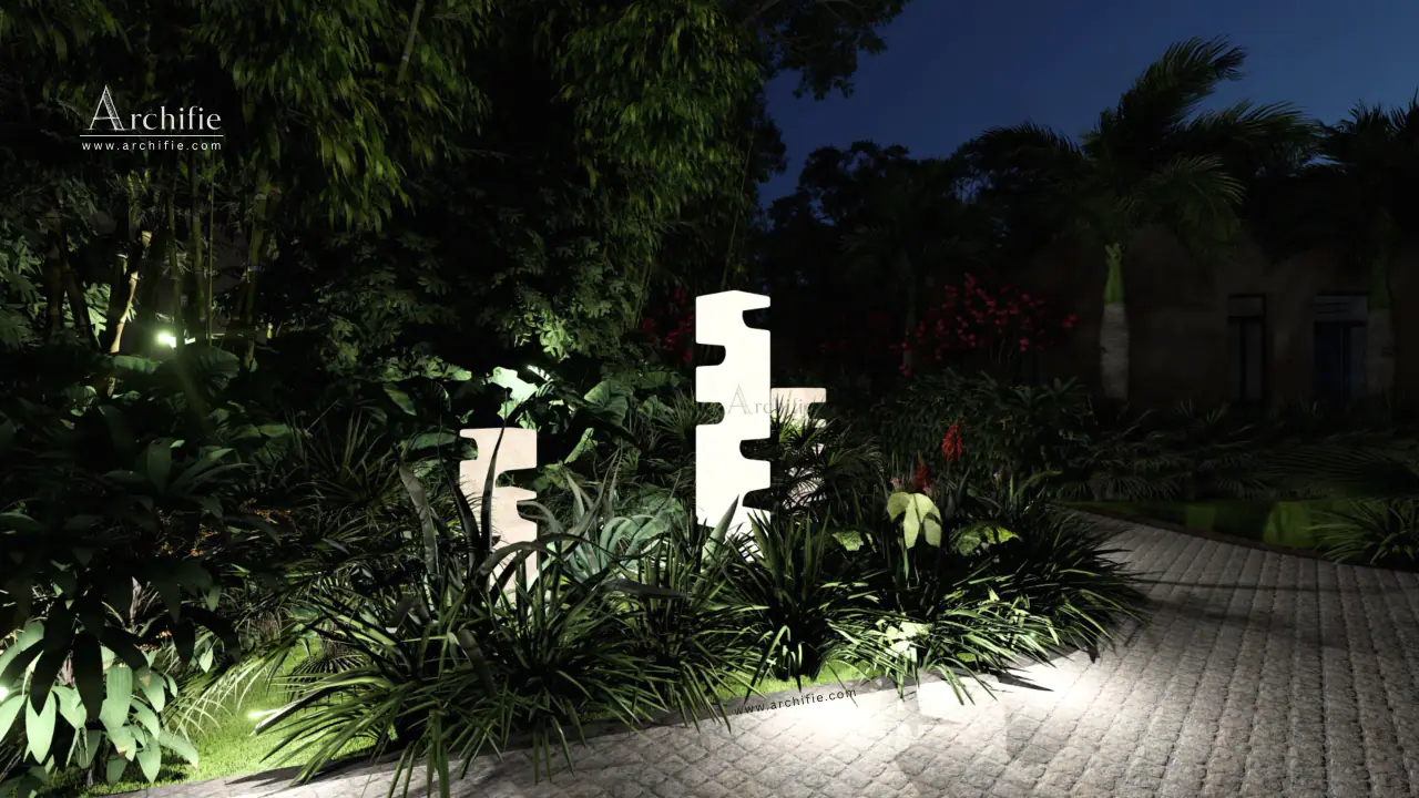 Illuminated sculptures among the jungle planting