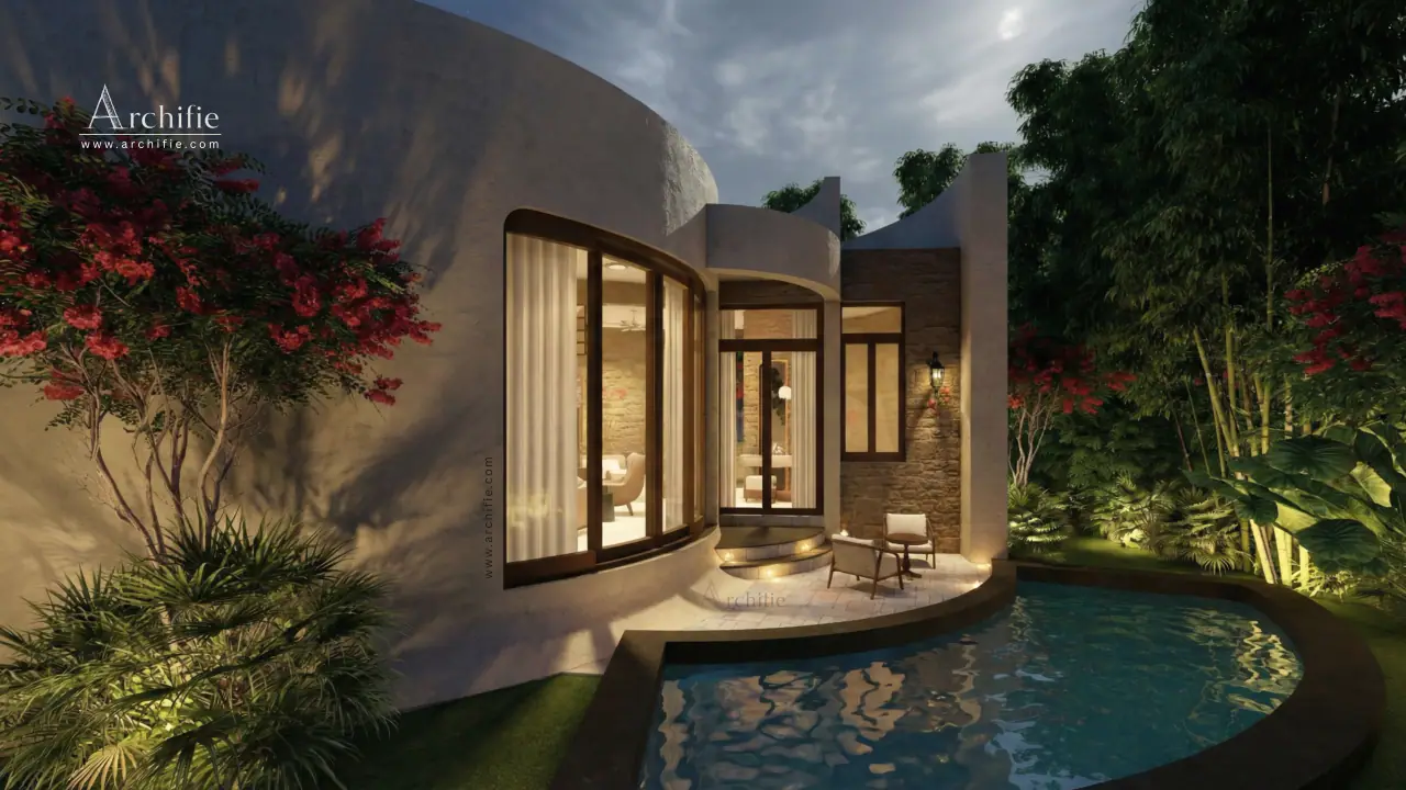 A Vanyara private nature residence at dusk, its pool and interiors lit from within